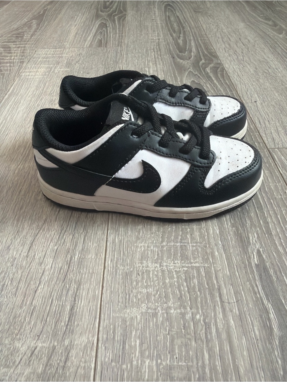 Nike Kids Black and White Low-Top Sneakers with Swoosh
